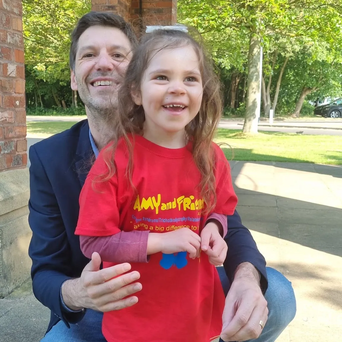 Karolina with Dr. Nejc Jelen, president of the Viljem Julijan Association, at the international Cockayne syndrome family meeting